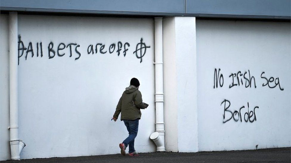 The EU’s chief Brexit negotiator has accused the UK of effectively putting “a gun on the table” by introducing a bill to scrap post-Brexit trade rules between Britain and Northern Ireland.