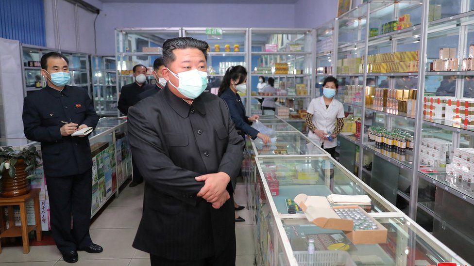 North Korea’s Covid outbreak began with citizens touching “alien things” that had fallen near its South Korea border, state media in Pyongyang has claimed.