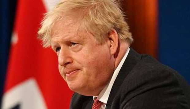 UK PM Boris Johnson back in crisis mode after foreign tour