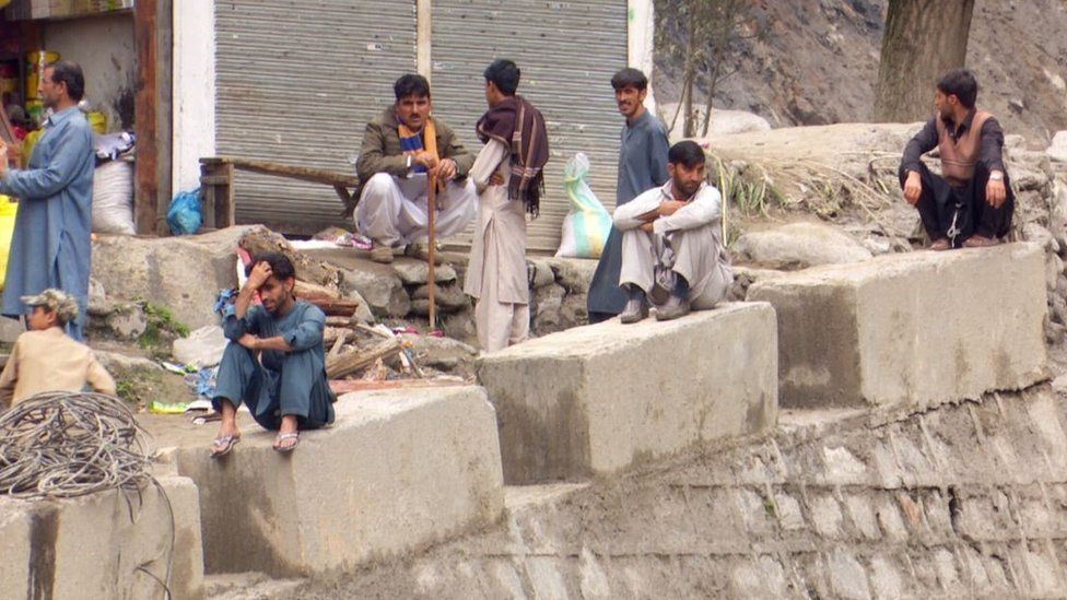 Hundreds of people are stranded across the river in the Manoor valley of Pakistan’s Khyber Pakhtunkhwa province after a flash flood hit the region on Friday, destroying at least 10 bridges and dozens of buildings.