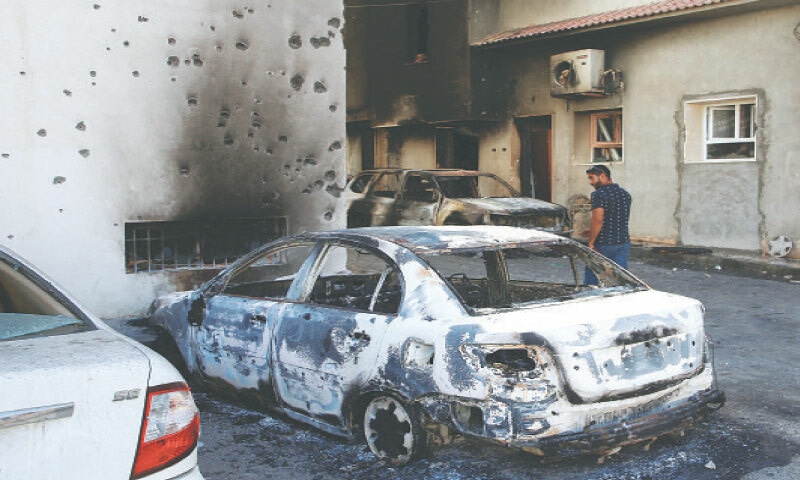 Clashes in Libya leave 32 dead before tentative calm
