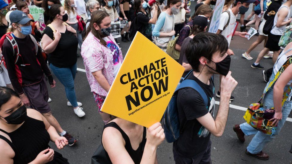 Australia’s parliament has passed legislation enshrining a pledge to slash carbon emissions by 43% by 2030 and to net zero by 2050.