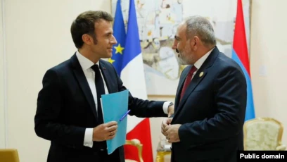 Azerbaijan says no talks with Armenia if Macron attends