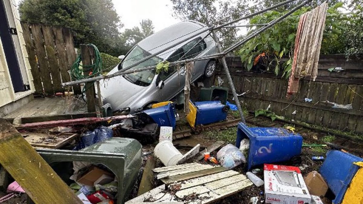 At least three people have died and one is missing after New Zealand’s largest city experienced its “wettest day on record” on Saturday