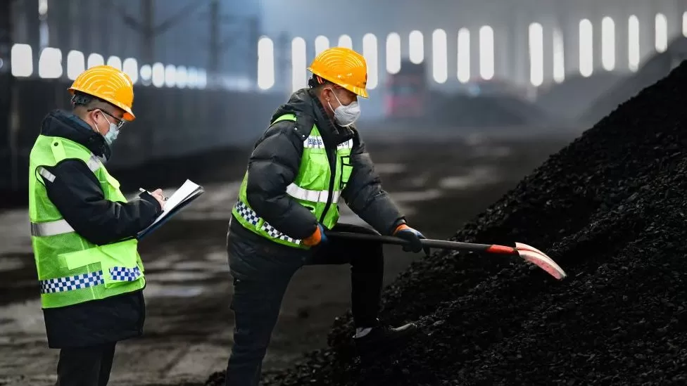 At least two people have died and more than 50 are missing after a mine collapsed in northern China.