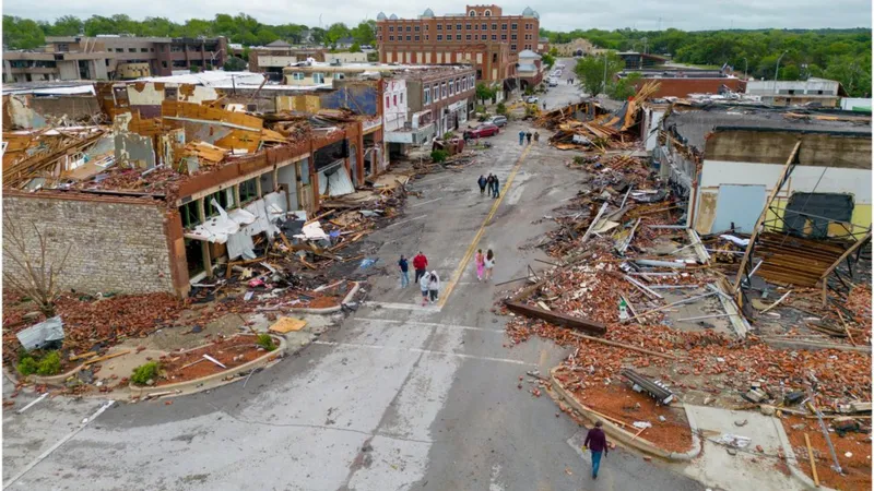 At least five people, including a four-month-old baby, have been killed after dozens of tornadoes ripped through the central US causing serious damage.