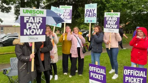 Unions to decide on deal to avert waste worker strikes