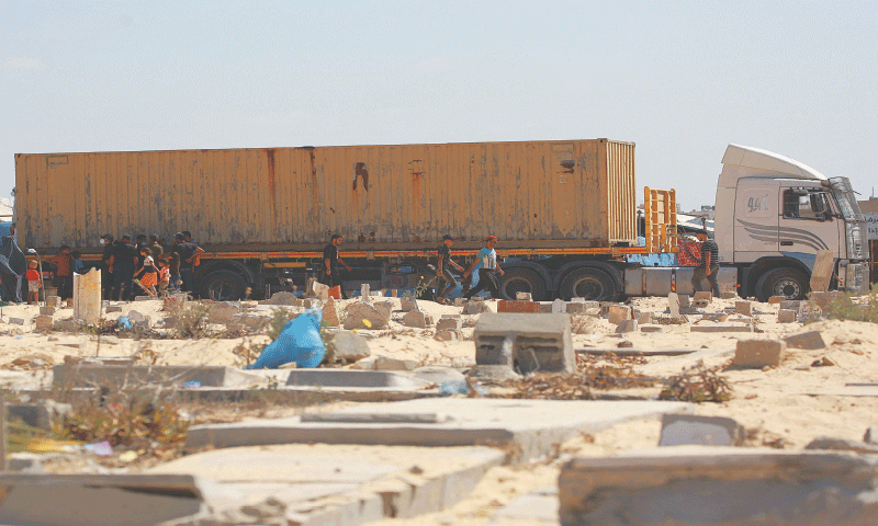 Palestinians bury 80 bodies handed over by Israel
