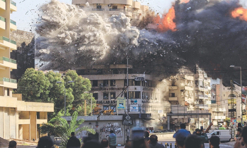 Five medics killed, high-rise toppled in southern Lebanon